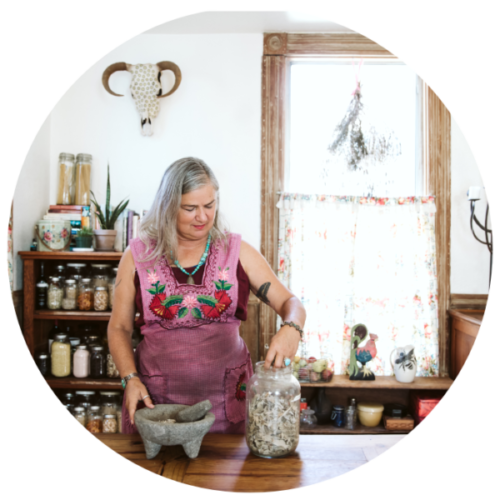 Ratka Popovic using pestle and herbs